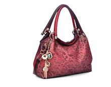 Tooled-vegan-leather-handbag