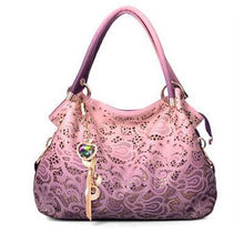 Tooled-man-made-leather-handbag